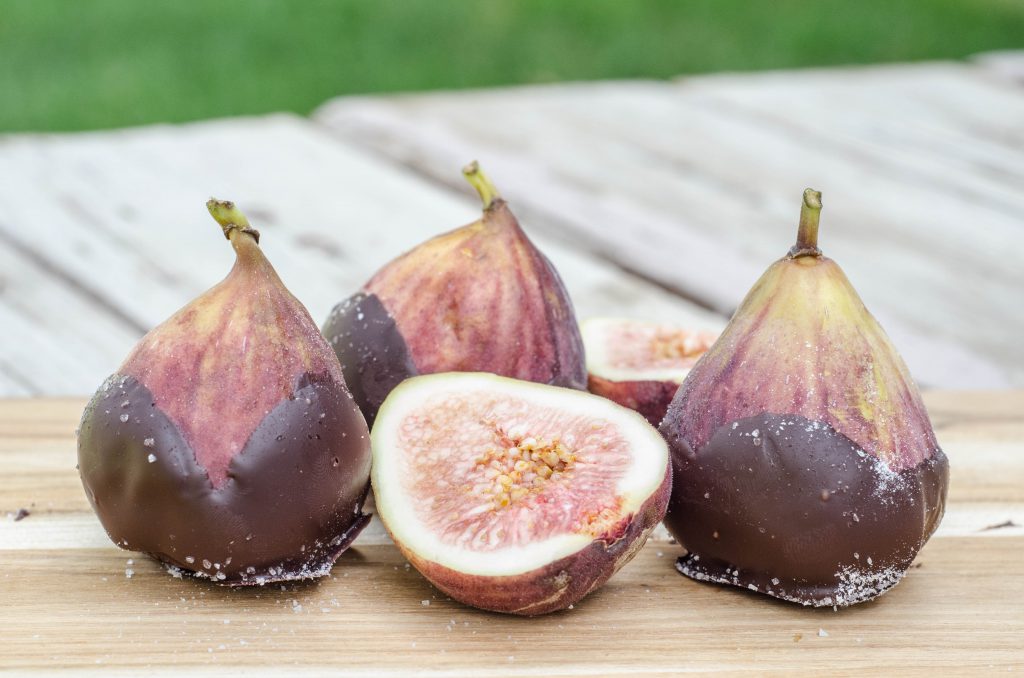 Dark Chocolate Dipped Figs with Sea Salt 6 fresh figs 8 ounces dark chocolate, melted Sea salt Place parchment paper on a plate or small baking sheet. Chop or break up chocolate and place in small glass bowl. Microwave for 30 seconds. Stir and repeat until the chocolate is melted. Dip the bottom third of each fig into the melted chocolate. Place on parchment paper and sprinkle chocolate with sea salt. 