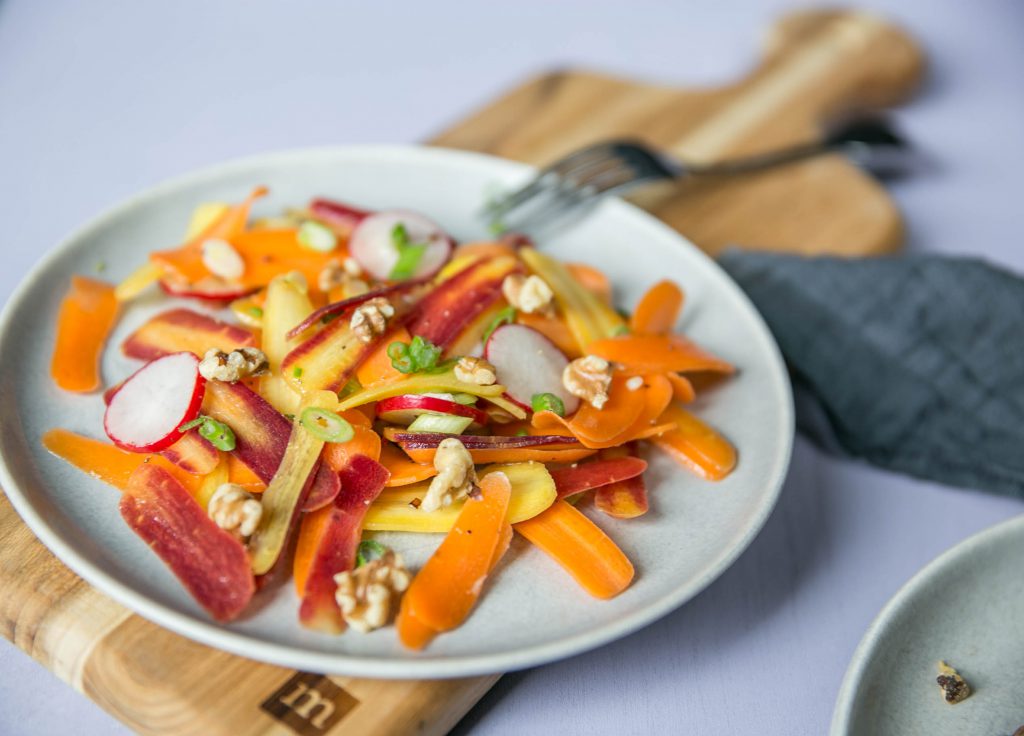 3/4 shot of carrot scallion coriander salad