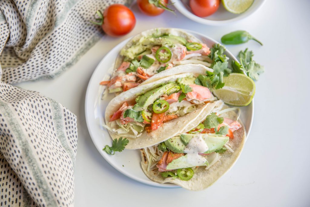 Plate with three chili lime salmon tacos