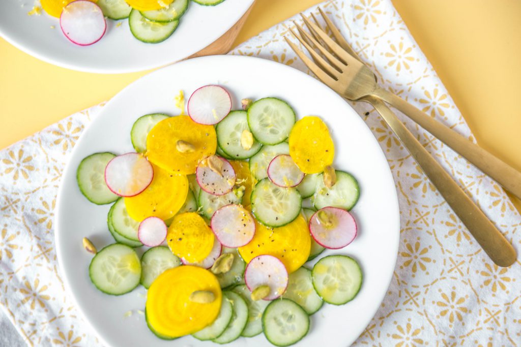 Overhead shot of golden beet and cucumber salad