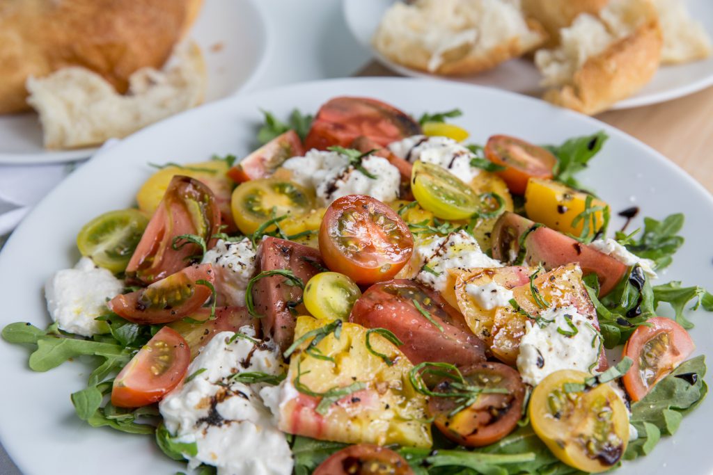 Side angle of Burrata Caprese Salad